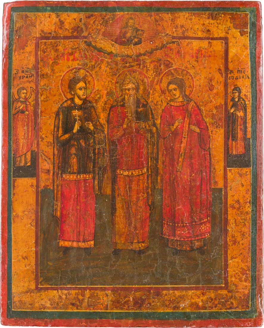 | KLEINE IKONE MIT DEN HEILIGEN SAMON, GURIJ UND AVIV: A SMALL ICON SHOWING STS. SAMON, GURIY AND AVIV Russian, 19th century Tempera on wood panel. The background made of silver, covered by a golden lacquer. Two selected saints on the borders: Guardian An