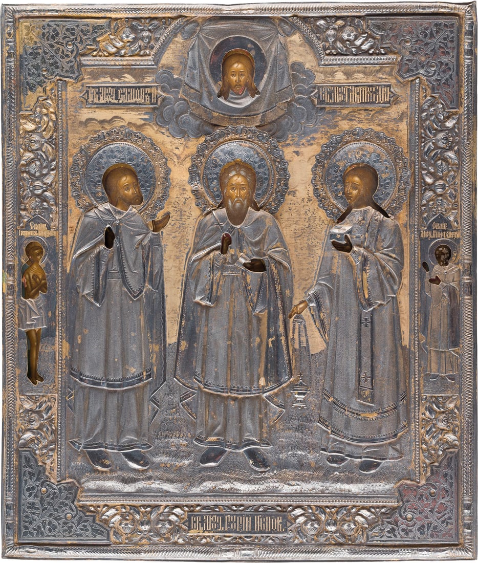 | SEHR FEINE UND GROSSE IKONE MIT DEN HEILIGEN SAMON, GURIJ UND AVIV MIT VERMEIL-OKLAD: A VERY FINE AND LARGE ICON SHOWING STS. SAMON, GURIY AND AVIV WITH A SILVER-GILT OKLAD Russian, 19th century (icon), Russian, Moscow, Semen Galkin, 1896-1908 (oklad) Tempera on wood panel. Finely pain