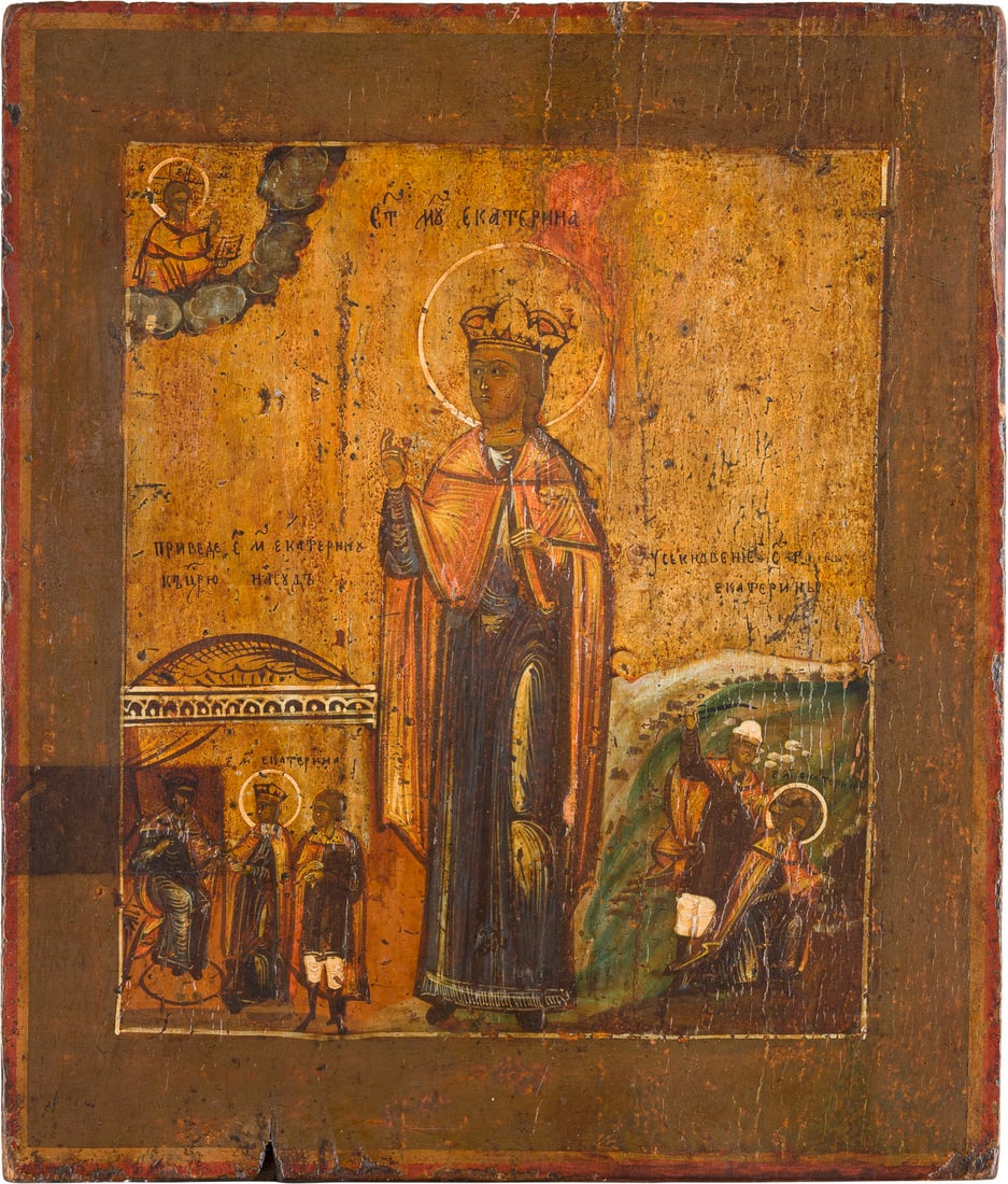 | IKONE MIT DER HEILIGEN KATHARINA: AN ICON SHOWING ST. CATHERINE Russian, 19th century Tempera on wood panel. The background made of silver, covered by a golden lacquer. Losses, partially restored. 30.8 x 26 cm.IKONE MIT DER HEILIGEN K