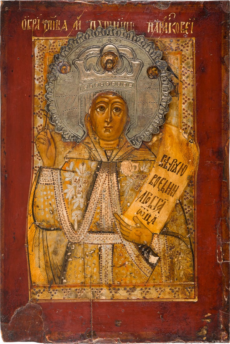 | IKONE MIT DER HEILIGEN PARASKEWA: AN ICON SHOWING ST. PARASKEVA Russian, circa 1800 Tempera on wood panel. The background made of silver, covered by a golden lacquer. The background and garments ornately punched. Applied metal halo. L