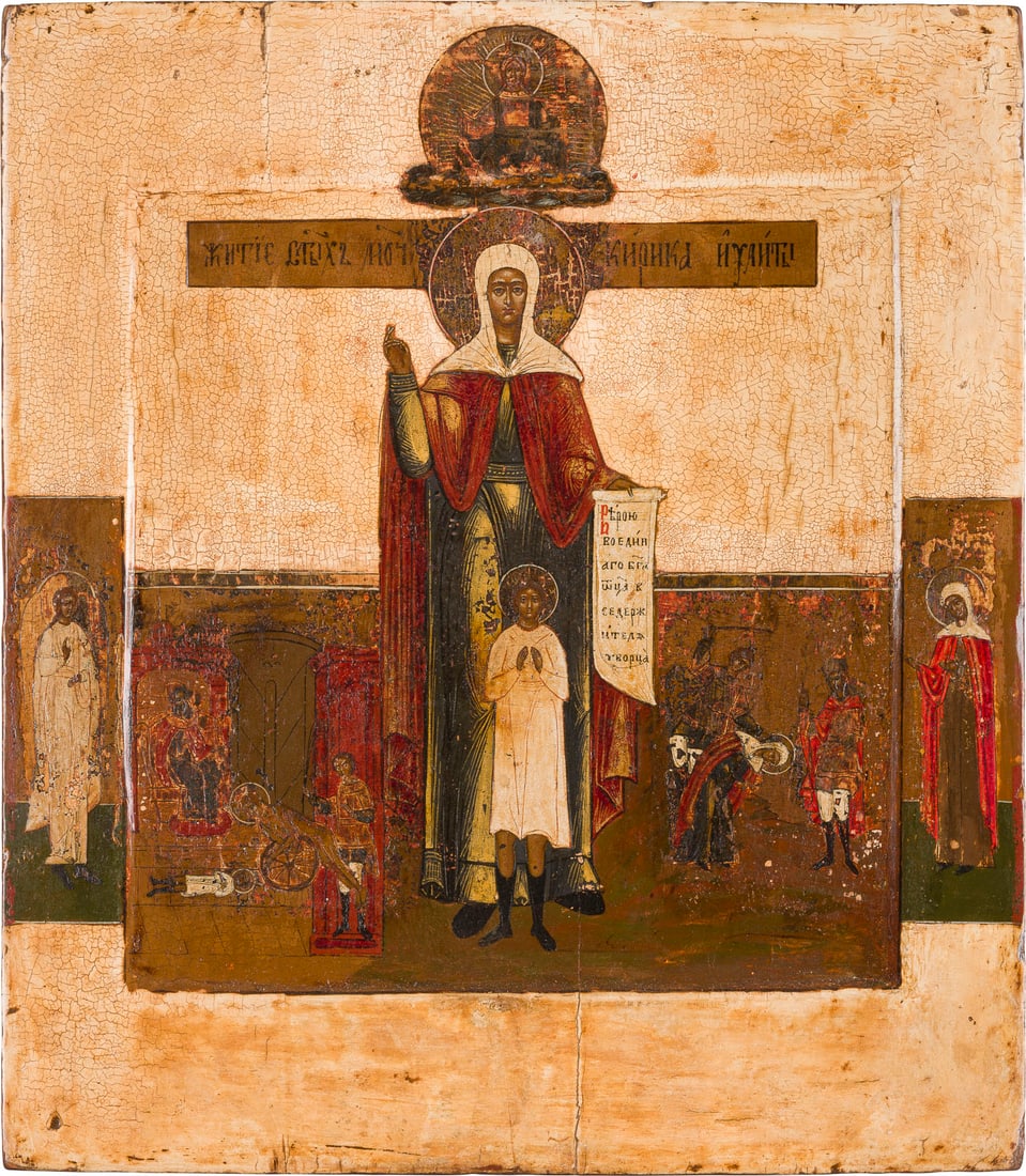 | IKONE MIT DEN HEILIGEN JULITTA UND KIRIK: AN ICON SHOWING STS. YULITTA AND KIRK Russian, 19th century Tempera on wood panel with kovcheg. Two selected saints on the borders, the Guardian Angel among them. The background and border stripped to