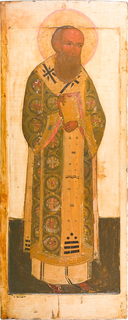 | MONUMENTALE IKONE MIT DEM HEILIGEN GREGOR DEM THEOLOGEN AUS EINER KIRCHEN-IKONOSTASE: A MONUMENTAL ICON SHOWING ST. GREGORY THE THEOLOGIAN FROM A CHURCH ICONOSTASIS Russian, 17th century Tempera on wood panel with kovcheg. The background and border stripped to gesso, partially restored
