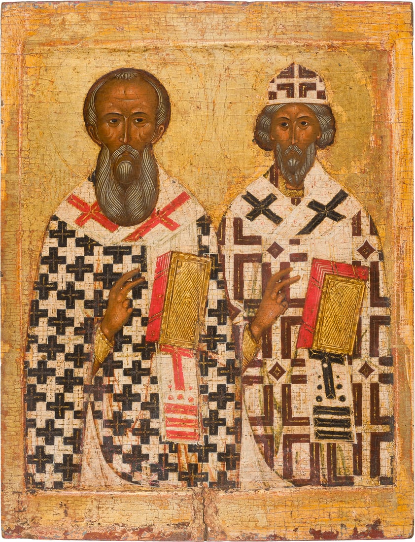| MUSEALE IKONE MIT DEN HEILIGEN KIRCHENVAeTERN ATHANASIUS DEM GROSSE UND KYRILL VON ALEXANDRIEN: AN IMPORTANT ICON WITH THE HOLY CHURCH FATHERS ATHANASIUS THE GREAT AND CYRIL OF ALEXANDRIA Russian, 15th century Tempera on wood panel with kovcheg. Finely painted against a golden background. Inscri