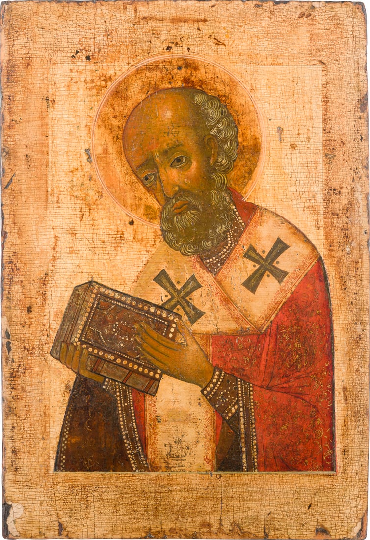 | GROSSFORMATIGE IKONE MIT DEM HEILIGEN NIKOLAUS VON MYRA AUS EINER KIRCHEN-IKONOSTASE: A VERY LARGE ICON SHOWING ST. NICHOLAS OF MYRA FROM A CHURCH ICONOSTASIS Russian, 17th century Tempera on wood panel. Rendered traditionally with a severe expression, his garments with gilt ornamentat
