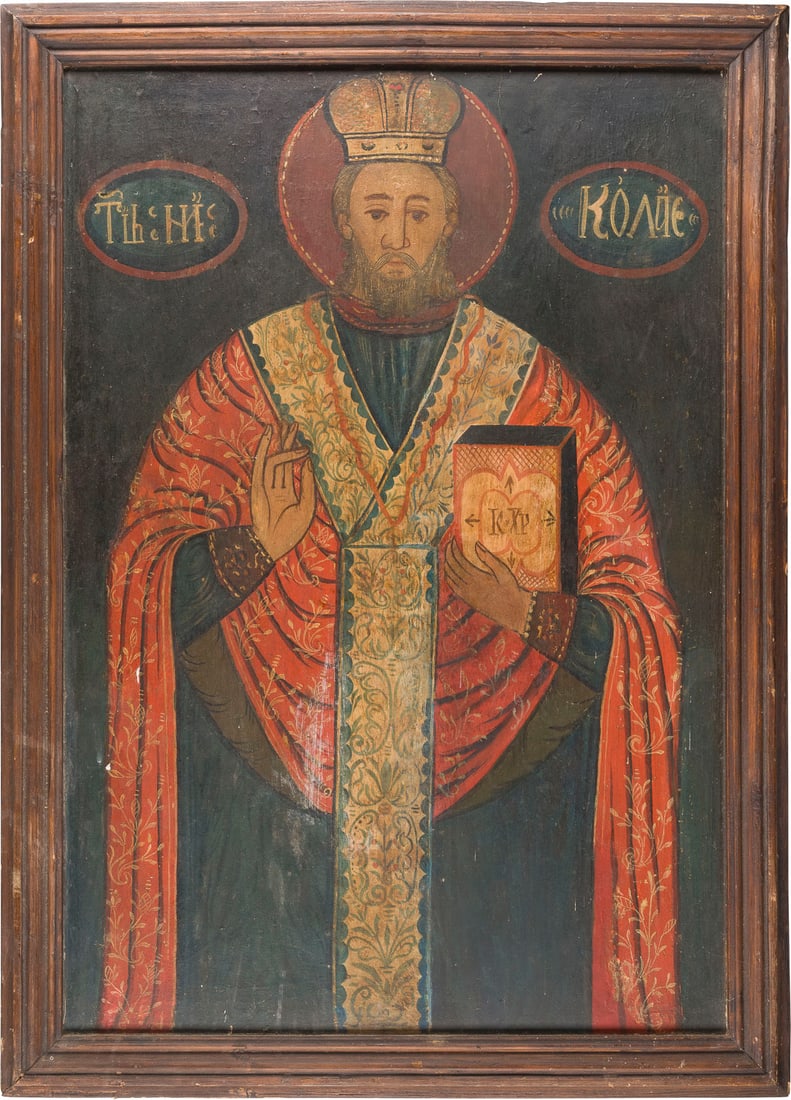| MONUMENTALE IKONE MIT DEM HEILIGEN NIKOLAUS VON MYRA AUS EINER KIRCHEN-IKONOSTASE: A MONUMENTAL ICON SHOWING ST. NICHOLAS OF MYRA FROM A CHURCH ICONOSTASIS Romanian, 18th century Oil on wood panel. Minimally restored. 83.7 x 60 cm.MONUMENTALE IKONE MIT DEM HEILIGEN NIKOLAUS VON MYRA