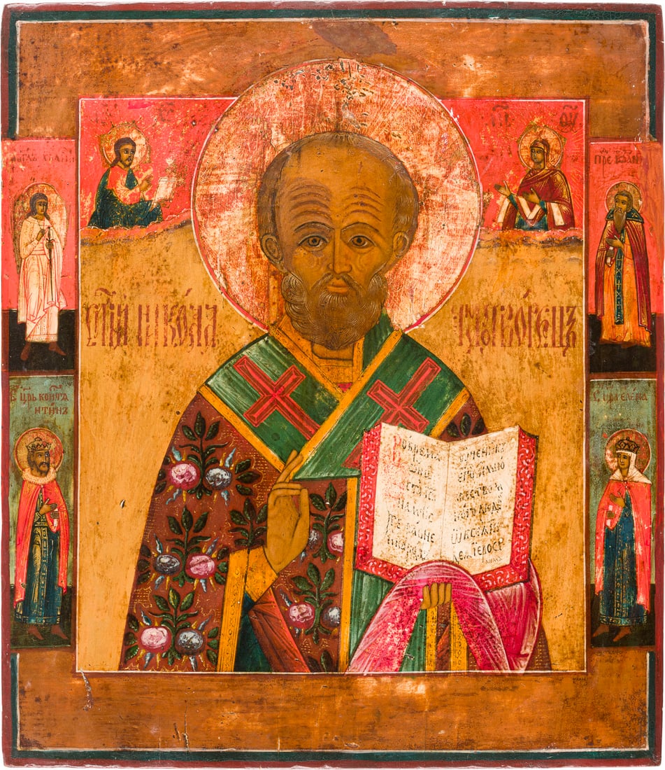 | ZWEI IKONEN: CHRISTUS PANTOKRATOR UND HEILIGER NIKOLAUS VON MYRA: TWO ICONS SHOWING CHRIST PANTOKRATOR AND ST. NICHOLAS OF MYRA Russian, 19th century Tempera on wood panels. The background made of silver, covered by a golden lacquer. The haloes made of gold. One ico