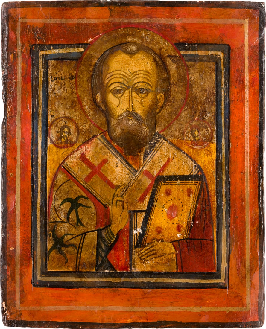 | IKONE MIT DEM HEILIGEN NIKOLAUS VON MYRA: AN ICON SHOWING ST. NICHOLAS OF MYRA Russian, 19th century Tempera on wood panel. The background made of silver, covered by a golden lacquer. Areas of restoration. 34.7 x 28.2 cm.IKONE MIT DEM HEILIGE