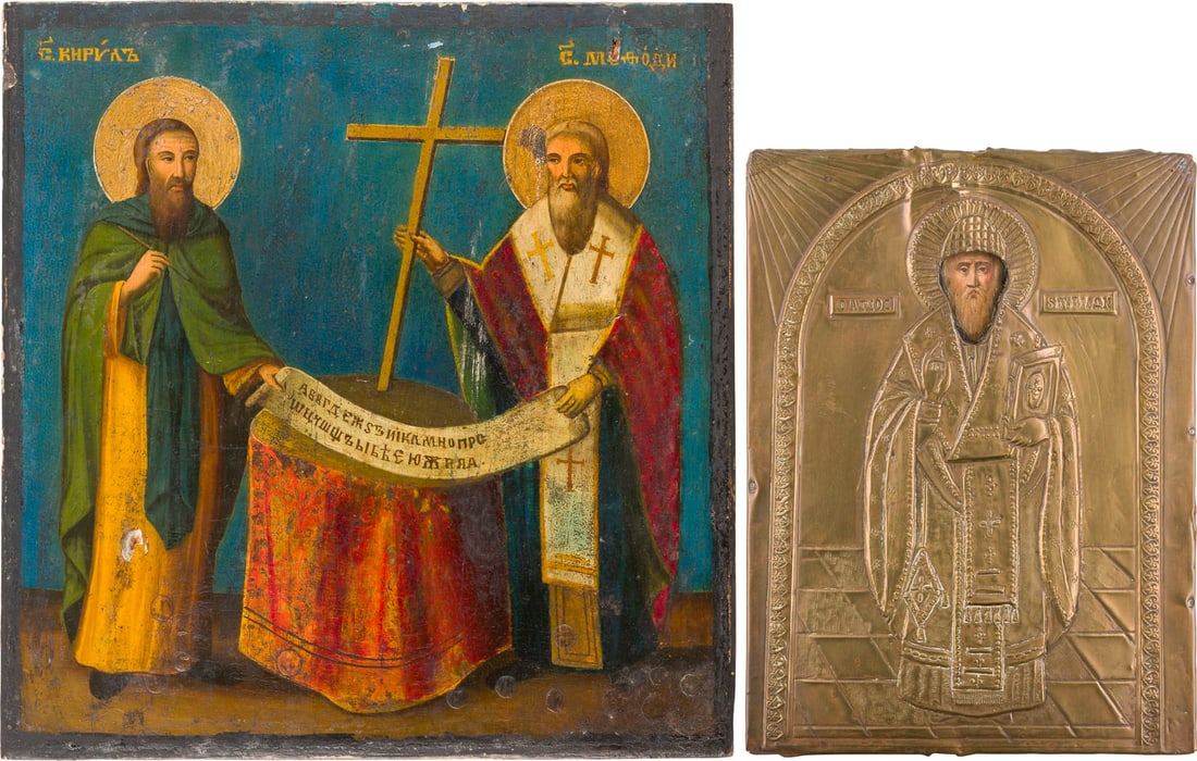 | ZWEI IKONEN: HEILIGER SPIRIDON VON KORFU MIT OKLAD UND DIE HEILIGEN KYRILL UND METHOD: TWO ICONS: ST. SPYRIDON OF CORFU WITH OKLAD AND STS. CYRIL AND METHODIUS Balkans / Greek, 19th century Oil on wood panels. The brass oklad chased and repousse. Minor losses. 28.5 x 21.6 cm / 35.3 x 35