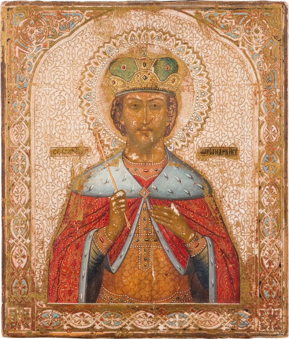 | IKONE MIT DEM HEILIGEN ALEXANDER NEWSKI: AN ICON SHOWING ST. ALEXANDER NEVSKY Russian, circa 1875 Tempera on wood panel with velvet backing. The wood gilded and incised to resemble a chased gilded silver oklad. The patterns of spandrels and