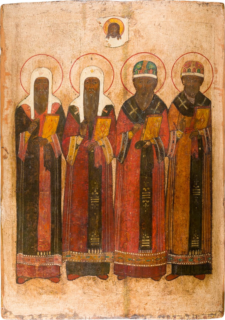 | MONUMENTALE IKONE MIT DEN VIER METROPOLITEN VON MOSKAU - FUeRSPRECHER FUeR GANZ RUSSLAND: A MONUMENTAL ICON SHOWING FOUR METROPOLITANS OF MOSCOW FROM A CHURCH ICONOSTASIS Russian, 18th century Tempera on wood panel. The background stripped to gesso, vertical crack restored. 87.5 x 62.2 cm.