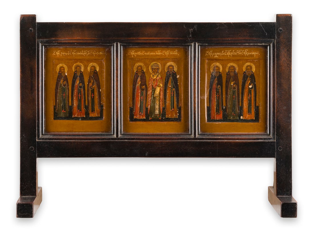 | DREI KLEINFORMATIGE IKONEN MIT AUSGEWAeHLTEN MOeNCHS-HEILIGEN: THREE SMALL ICONS SHOWING SAINTS IN MONKISH ATTIRE Russian, 17th century Tempera on wood panels with kovcheg. The haloes made of gold. Minor losses. Each 14.5 x 12 cm, 30.5 x 42 cm (with wooden stand)