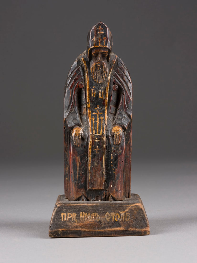 | HEILIGER NIL VON STOLOBNOE: A WOODEN CARVED FIGURE OF ST. NIL STOLOBENSKIY Russian, 19th century Naturalistically carved. 18.5 cm high.HEILIGER NIL VON STOLOBNOE Russland, 19. Jh. Holz, plastisch geschnitzt, farbig gefasst. H. 1