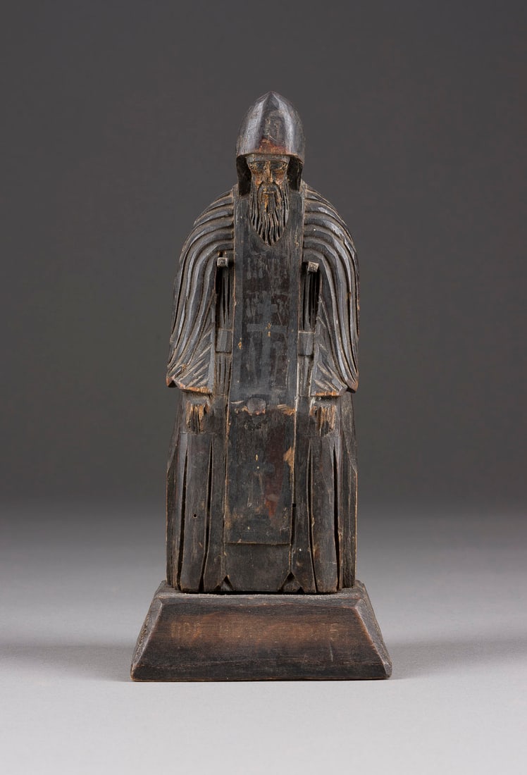 | HEILIGER NIL VON STOLOBNOE: A CARVED WOODEN FIGURE OF ST. NIL OF STOLOBNOE Russian, 19th century Naturalistically carved. Minimally damaged. 22.5 cm high.HEILIGER NIL VON STOLOBNOE Russland, 19. Jh. Holz, vollplastisch geschnitz