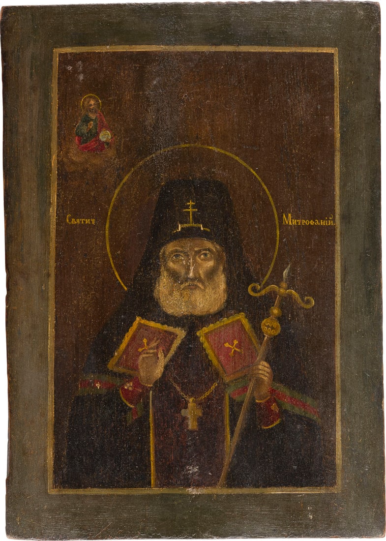 | IKONE MIT DEM HEILIGEN MITROFAN VON WORONESCH: AN ICON SHOWING ST. MITROPHAN OF VORONEZH Russian, after 1832 Tempera on wood panel. Areas of restoration. 33.4 x 23.8 cm.IKONE MIT DEM HEILIGEN MITROFAN VON WORONESCH Russland, nach 1832 Einzeltafel