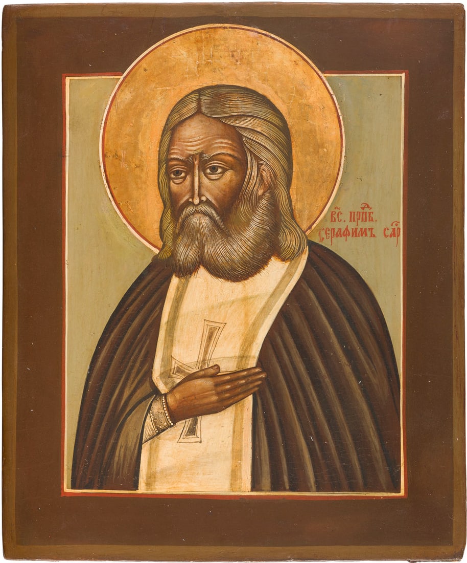 | IKONE MIT DEM HEILIGEN SERAFIM VON SAROW: AN ICON SHOWING ST. SERAPHIM OF SAROV Russian, after 1903 Tempera on wood panel. The halo made of silver, covered by a golden lacquer. Partially restored. 35.3 x 29.6 cm.IKONE MIT DEM HEILIGEN SERAFIM