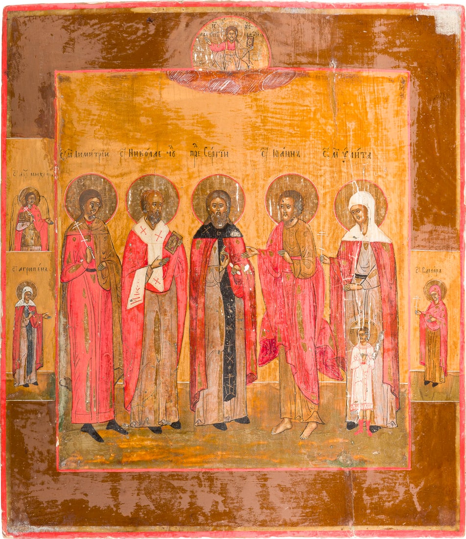 | PATRONATSIKONE MIT AUSGEWAeHLTEN HEILIGEN: AN ICON SHOWING A SELECTION OF FAMILY PATRON SAINTS Russian, 19th century Tempera on wood panel with kovcheg. The haloes made of silver, covered by a golden lacquer. Three selected saints on the borde