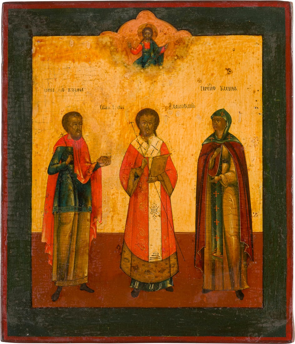 | IKONE MIT DEN HEILIGEN KOSMAS, JOHANNES CHRYSOSTOMUS UND XENIA: AN ICON SHOWING STS. COSMAS, JOHN CHRYSOSTOM AND KSENIA Russian, 19th century Tempera on wood panel. The borders partially restored. 30.3 x 26 cm.IKONE MIT DEN HEILIGEN KOSMAS, JOHANNES CHRYSOSTOMUS U