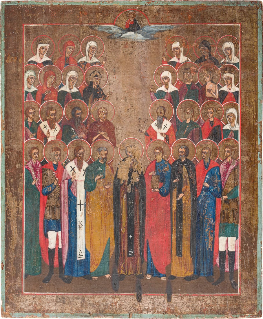 | GROSSFORMATIGE PATRONATSIKONE MIT 31 HEILIGEN: A VERY LARGE ICON SHOWING 31 SELECTED SAINTS Russian, 19th century Tempera on wood panel. The background made of silver, covered by a golden lacquer. Losses. 53.2 x 44 cm.GROSSFORMATIGE PATRONATSIKONE