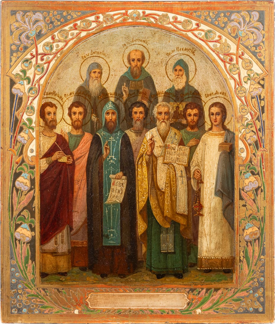 | FEINE JUGENDSTIL-PATRONATSIKONE MIT ZEHN AUSGEWAeHLTEN HEILIGEN: A FINE ART NOUVEAU ICON SHOWING TEN SELECTED SAINTS Russian, early 20th century Oil on wood panel. The border emulating contemporary enamelwork. Minor losses. 31.2 x 26.7 cm.FEINE JUGENDSTIL-PATRONATS
