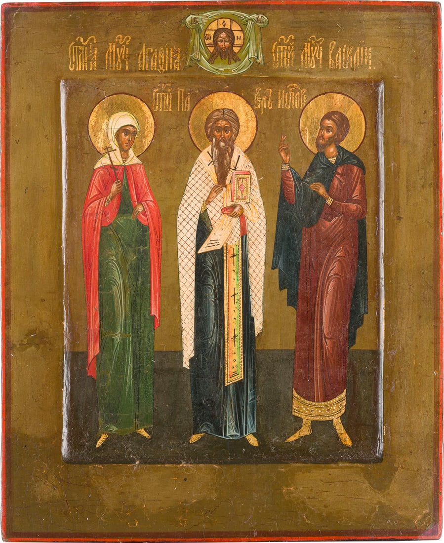 | KLEINE IKONE MIT DREI HEILIGEN: A SMALL ICON SHOWING THREE SELECTED SAINTS Russian, 19th century Tempera on wood panel with kovcheg. The haloes made of gold. The border partially restored. 26.5 x 21.8 cm.KLEINE IKONE MIT DREI HEILIG