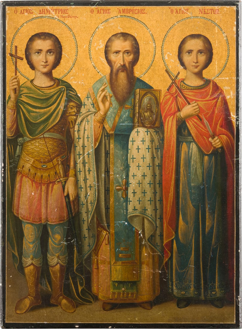 | IKONE MIT DEM HEILIGEN DEMETRIOS, AMBROSIOS UND NESTOR: AN ICON SHOWING ST. DEMETRIOS, AMBROSIOS AND NESTOR Mount Athos, circa 1900 Oil on wood panel. The golden background ornately incised. Minor scratches. 35.6 x 26 cm.IKONE MIT DEM HEILIGEN DEMETRIOS, A