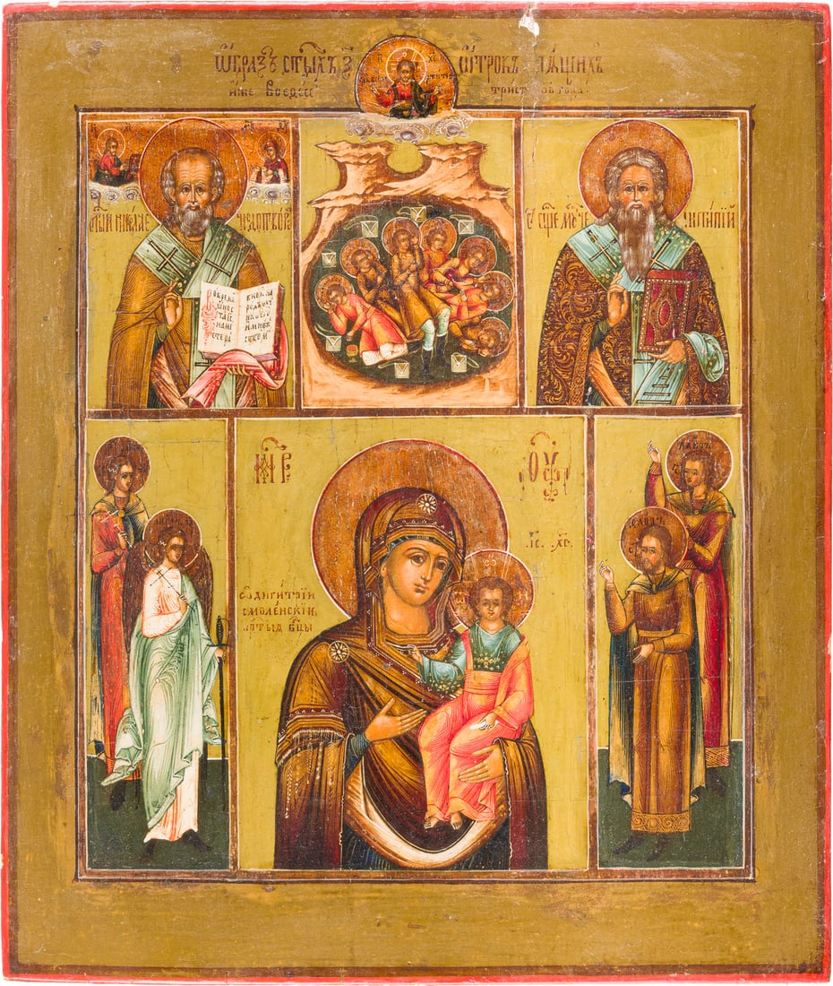 | MEHRFELDER-IKONE MIT DER GOTTESMUTTER SMOLENSKAJA UND AUSGEWAeHLTEN HEILIGEN: A MULTI-PARTITE ICON SHOWING THE SMOLENSKAYA MOTHER OF GOD AND SELECTED SAINTS Russian, 19th century Tempera on wood panel with kovcheg. The haloes made of silver, covered by a golden lacquer. Minor l
