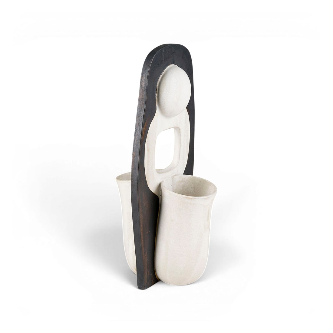 WALBURGA KUELZ | SKULPTURALES GEFAESS: WALBURGA KUELZ 1921 Mittelberg - 2002 Erbach SCULPTURAL VESSEL c. 1970/80 Sand-coloured clay, thrown, assembled, with a beige-white drip glaze and dark brown engobe. H. 37 cm, W. 15,5 cm, D. 17,5 cm.W