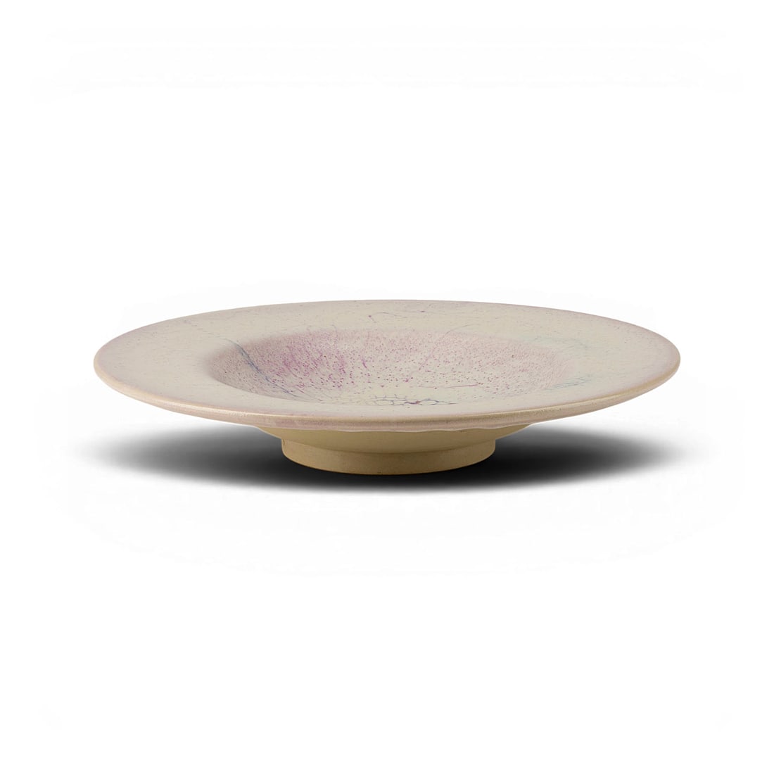 BARBARA STEHR | TELLER: BARBARA STEHR 1936 Weetzen PLATE Pale clay, beige body, heavy white drip glaze, crackle glaze in parts blue-violet, with a delicate powdery pink tinge. H. 6 cm, D. 35 cm. Workshop mark underneath (inc
