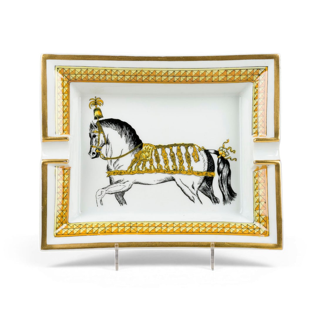 ATELIER HERMES | SCHALE 'CHEVAL DE CIRQUE': ATELIER HERMES France TRAY 'CHEVAL DE CIRQUE' White porcelain, polychrome overglaze decoration, gold trim, bands in black, yellow and orange. H. 3,7 cm, W. 19 cm, D. 16 cm. Marked 'HERMES - PARIS' and