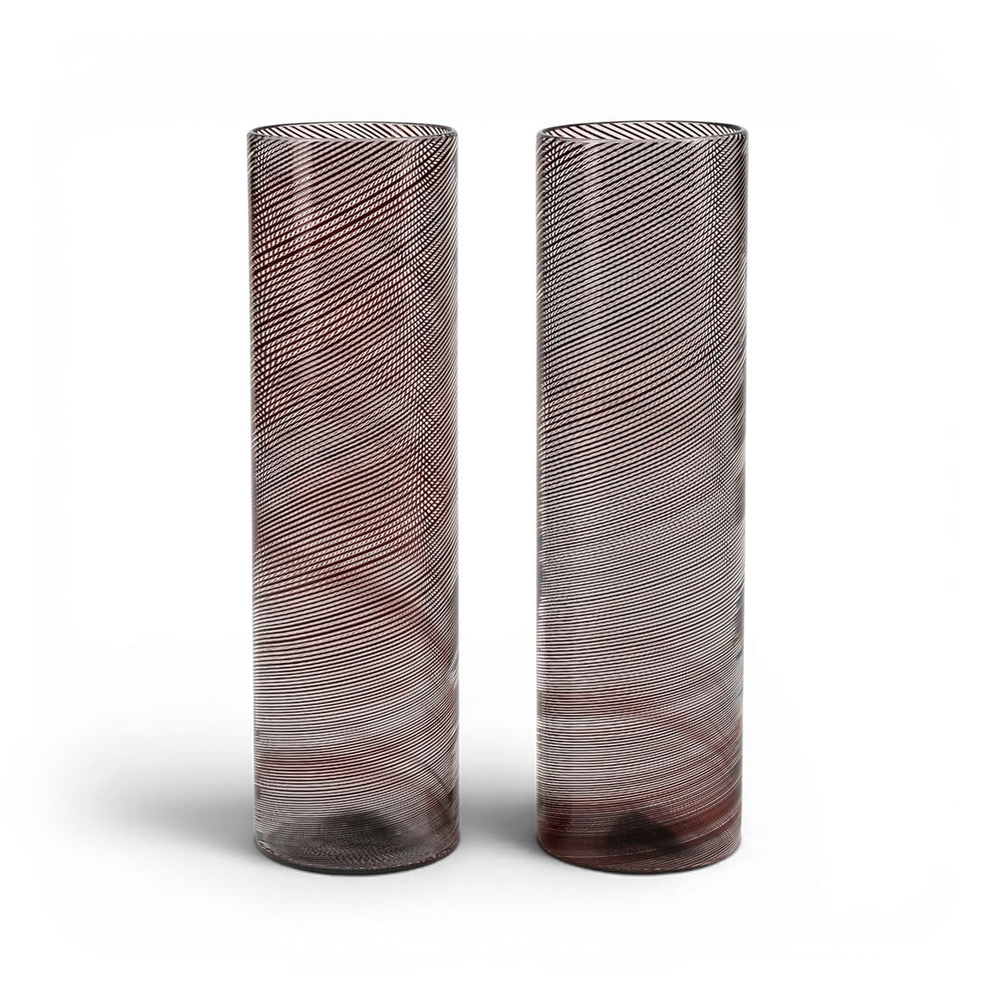 TAPIO WIRKKALA | PAAR VASEN 'FILIGRANA DI TAPIO': TAPIO WIRKKALA 1915 Hanko - 1985 Helsinki PAIR OF 'FILIGRANA DI TAPIO' VASES Italy, Venini & Co., designed 1966-68 Colourless glass spirally applied amethyst-coloured 'mezza fligrana' threads. H. 27 c
