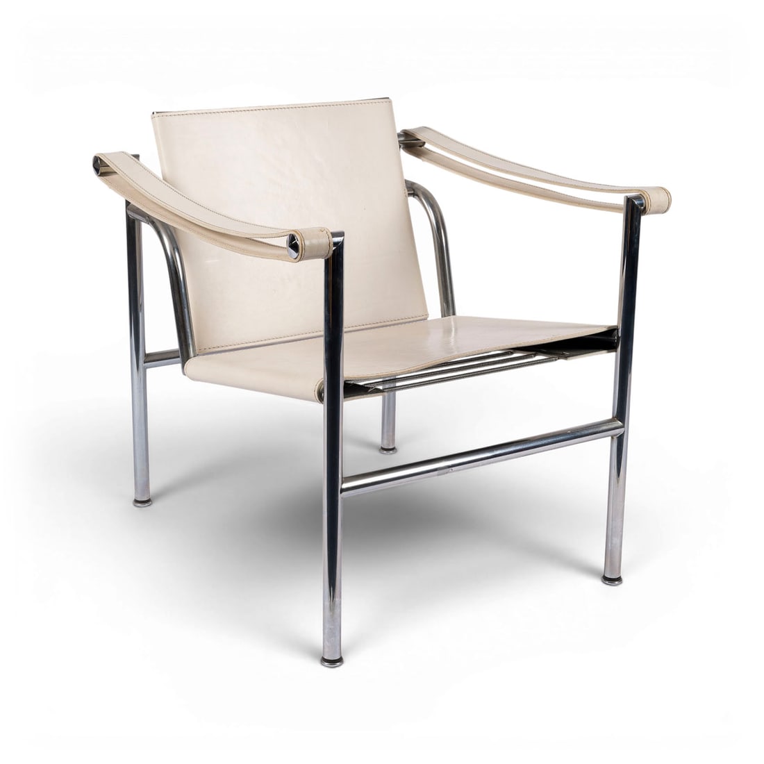 LE CORBUSIER, JEANNERET & PERRIAND | ARMLEHNSTUHL MODELL 'LC 1': LE CORBUSIER, JEANNERET & PERRIAND 'LC 1' ARMCHAIR Cassina, reedition since 1965, original design of 1928 Chrome-plated tubular steel, white leather. H. 66 cm, W. 59 cm, D. 65 cm. Marked Cassina and '