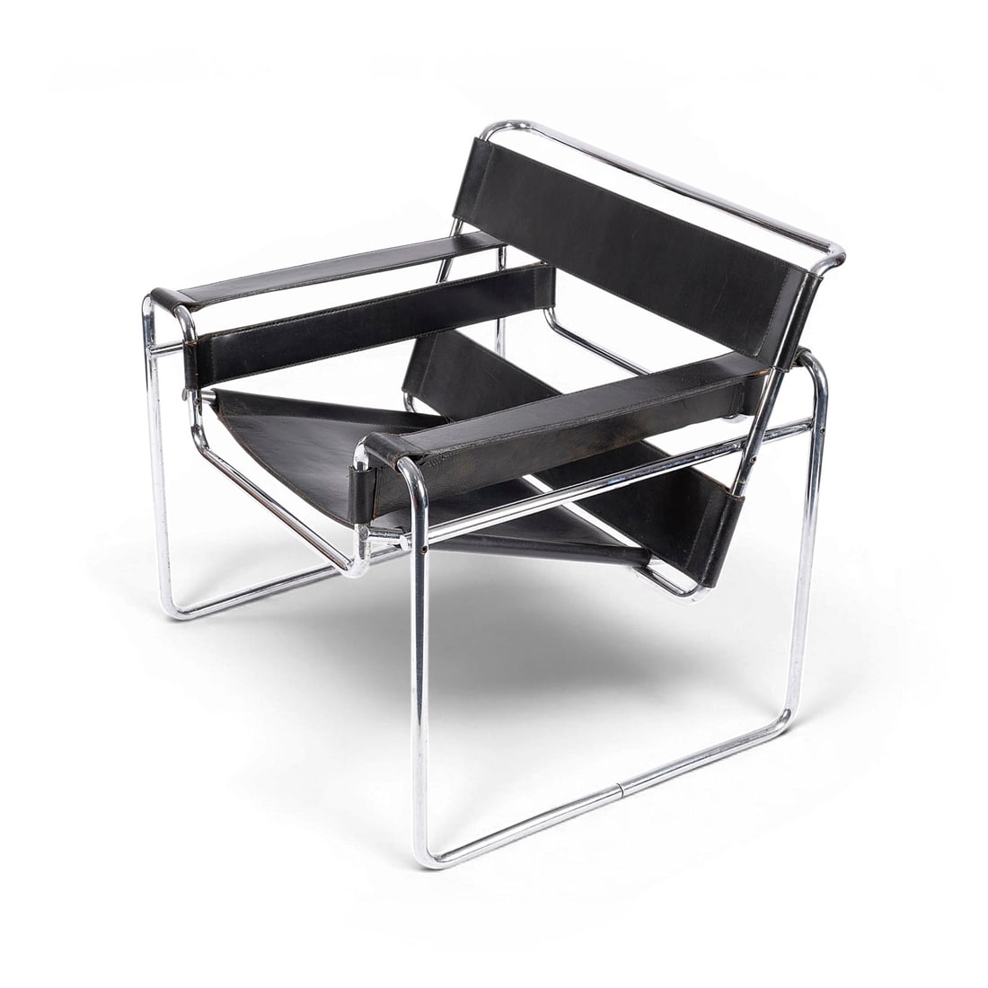 MARCEL BREUER | SESSEL 'B 3' 'WASSILY': MARCEL BREUER 1902 Pecs (Hungary) - 1981 New York City A 'WASSILY' ARMCHAIR 'B3' Italy, Gavina / Knoll International, designed at the Bauhaus in 1925 Chrome-plated steel, black leather. H. 73 cm, W. 7
