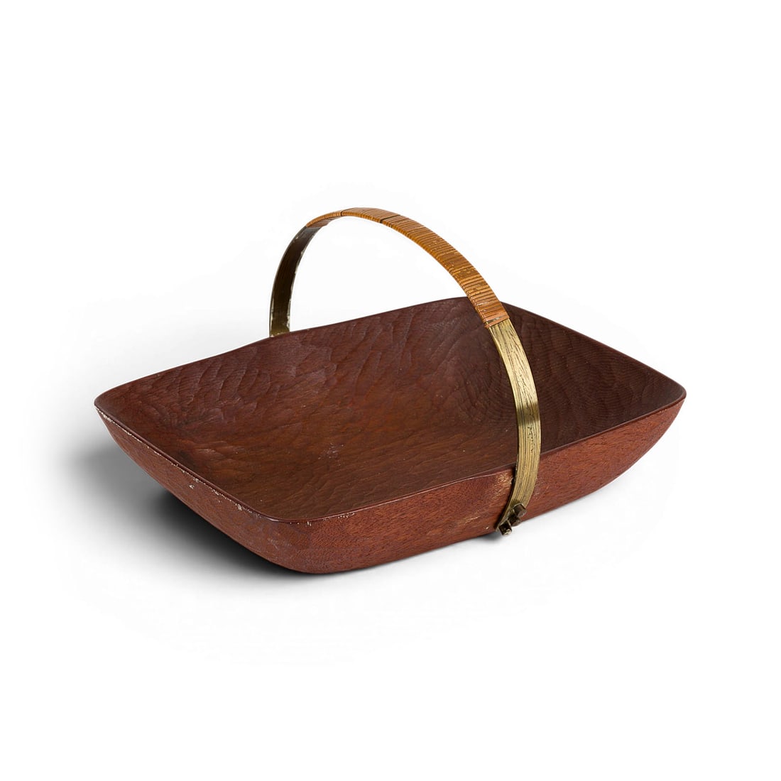 WERKSTAETTE AUBOECK (IM STILE VON) | HOLZSCHALE: AUBOECK WORKSHOP (IN THE MANNER OF) Circa 1960 WOODEN BOWL Probably Germany Teak, carved, brass sheet, rattan. H. 17 cm, W. 30 cm, D. 24 cm. Marked underneath 'Bremer Werkschau' (retailer's label). Li