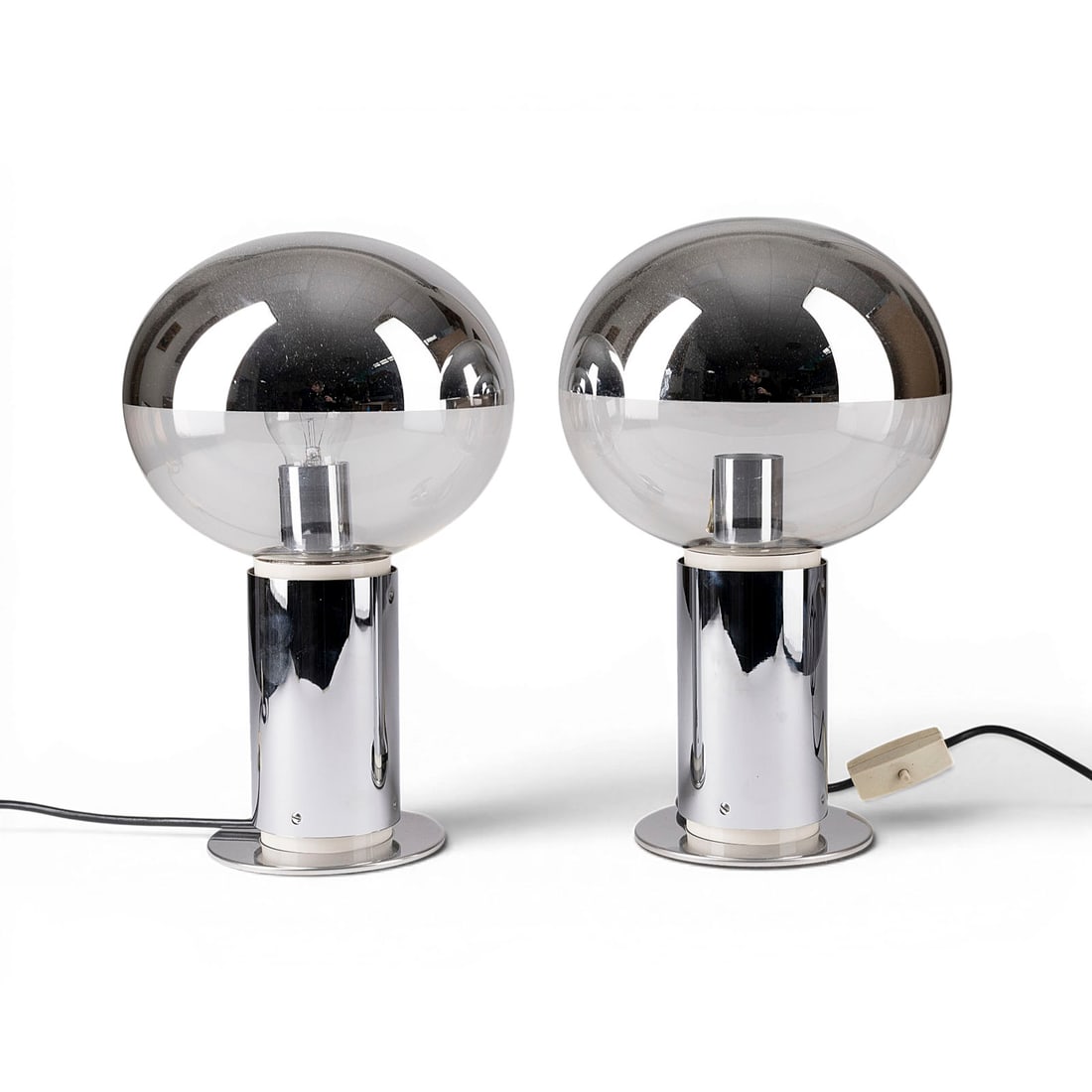 KLAUS HEHNER | PAAR TISCHLAMPEN MODELL '1391': KLAUS HEHNER Germany A PAIR OF MODEL '1391' TABLE LAMPS Germany, Staff Leuchten KG, designed 1971 Polished stainless steel, chrome-plated brass, plastic, glass, each single-light electrified. H. 39 cm
