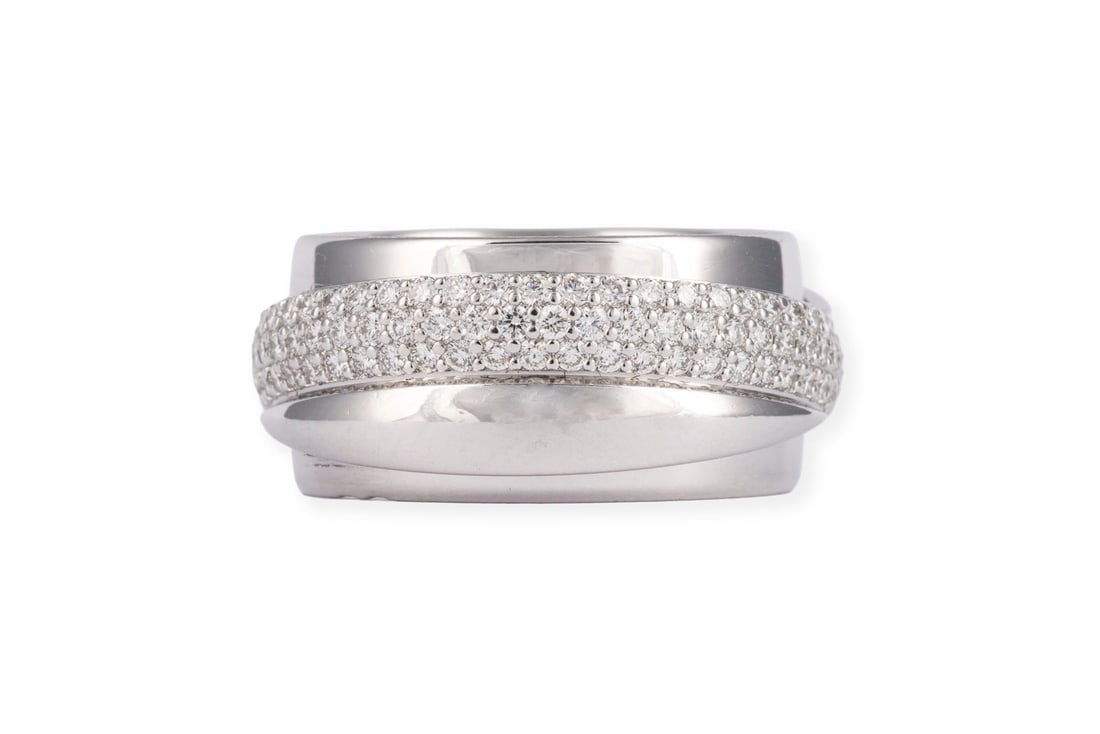 'PIAGET' POSSESSION RING: PIAGET' POSSESSION RING WG 750. Ringmass: ca. 53. Ringbreite: ca. 9,9 mm. Ges.-Gew.: ca. 15,7 g. 'Piaget' Possession Ring, besetzt mit Brillanten zus. ca. ueber 1.00 ct.