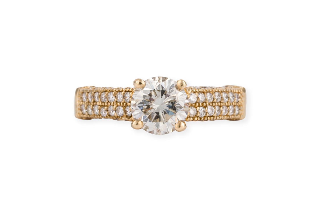 BRILLANT RING: BRILLANT RING GG 585. Ringmass: ca. 52. Ges.-Gew.: ca. 4,1 g. Ring, besetzt mit einem zentralen Brillanten von ca. 1.20 ct. I-J/SI2. Die restlichen 72 Brillanten auf der Ringschiene betragen zus. ca. 