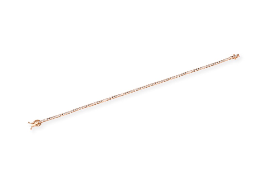 TENNIS ARMBAND: TENNIS ARMBAND RG 585. L.: ca. 17,5 cm. Ges.-Gew.: ca. 5,0 g. Tennisarmband, besetzt mit Brillanten zus. ca. 1.70 ct. Kastenschloss mit doppelter Sicherheitsacht.