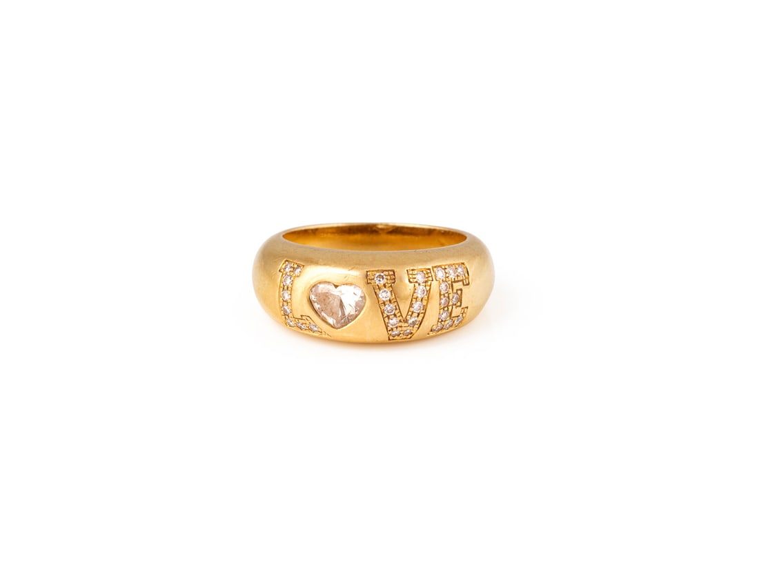 'CHOPARD' LOVE DIAMONDS RING: CHOPARD' LOVE DIAMONDS RING GG 750. Ringmass: ca. 56. Ringbreite: ca. 8,8 mm. Ges.-Gew.: ca. 12,1 g. Love Diamonds Ring von Chopard, besetzt mit einem zentralen Diamanten im Herzschliff von ca. 0.50