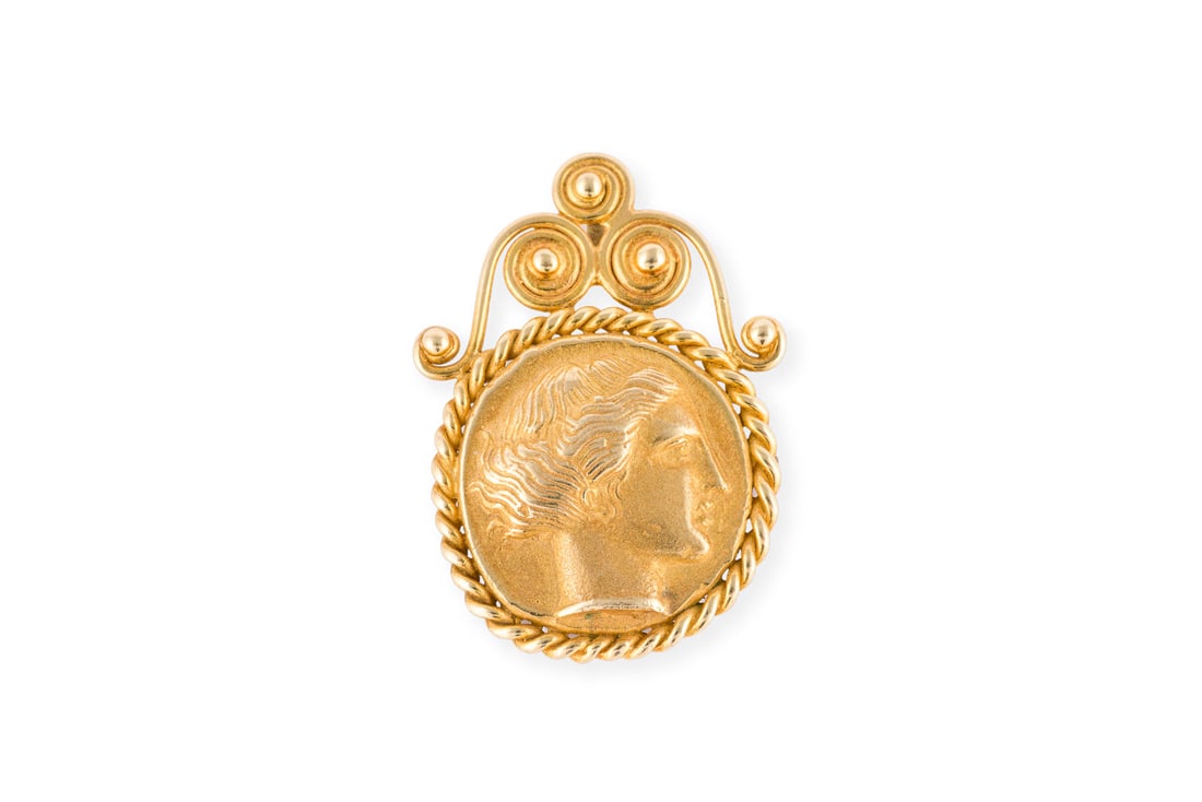 RELIEF BROSCHEN ANHAENGER: RELIEF BROSCHEN ANHAENGER GG 585. Masse: ca. 39,4 x 27,9 mm. Ges.-Gew.: ca. 9,9 g. Broschenanhaenger mit der Darstellung eines Maennerkopfes im Profil.