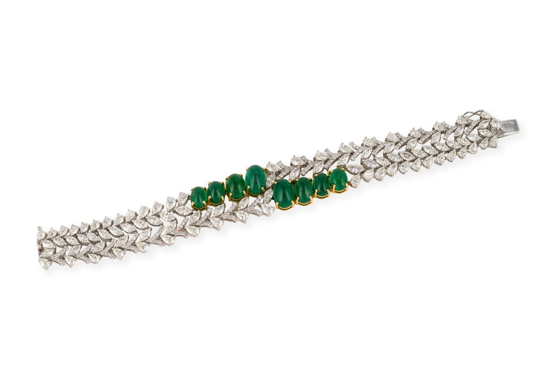SMARAGD ARMBAND: SMARAGD ARMBAND WG/GG 750. L.: ca. 17.0 cm. Ges.-Gew.: ca. 38,6 g. Armband, besetzt mit Smaragd-Cabochons zus. ca. 18.32 ct., gefasst in zwei Reihen mit Diamanten im Marquise- und Brillantschliff zus.