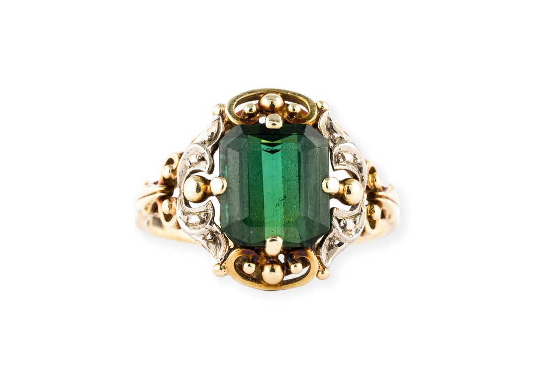 ZIERVOLLER TURMALIN RING: ZIERVOLLER TURMALIN RING PT/GG 585. Ringmass: ca. 53. Ringkopfmasse: ca. 14,3 x 13,3 mm. Ges.-Gew.: ca. 3,5 g. Ring, besetzt mit einem wohl synthetischen Turmalin von ca. 2.25 ct.