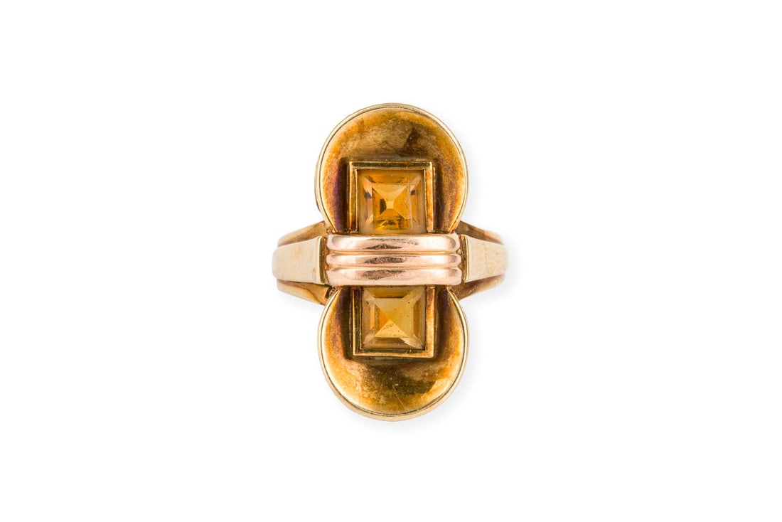 INFINITY RING: INFINITY RING GG 585. Ringmass: ca. 53. Ringkopfmasse: ca. 24,3 x 12,7 mm. Ges.-Gew.: ca. 5,3 g. Ring mit einem Ringkopf in Form einer ''Unendlichkeits-Schleife'', besetzt mit wohl Citrin-CarrEs.