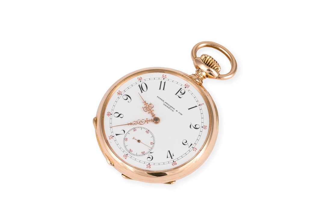'PATEK PHILIPPE' SELTENE TASCHENUHR: PATEK PHILIPPE' SELTENE TASCHENUHR Referenznummer: 211.904. Handaufzug (Nicht auf Funktion geprueft). GG 750. D.: ca. 51,6 mm. Ges.-Gew.: ca. 113,7 g. Inkl. Kopie des Registerauszugs. Weisses Ziffernb