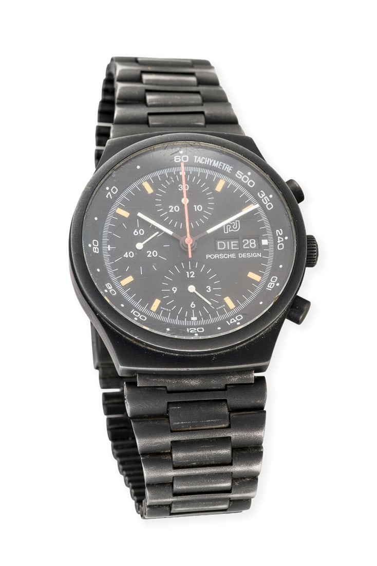 'ORFINA' PORSCHE DESIGN CHRONOGRAPH: ORFINA' PORSCHE DESIGN CHRONOGRAPH Referenznummer: 7750. Automatik (Nicht auf Funktion geprueft). Stahl - PVD Beschichtung. D.: ca. 40,0 mm. Im Kultfilm 'Top Gun' aus dem Jahr 1986 trug Tom Cruise