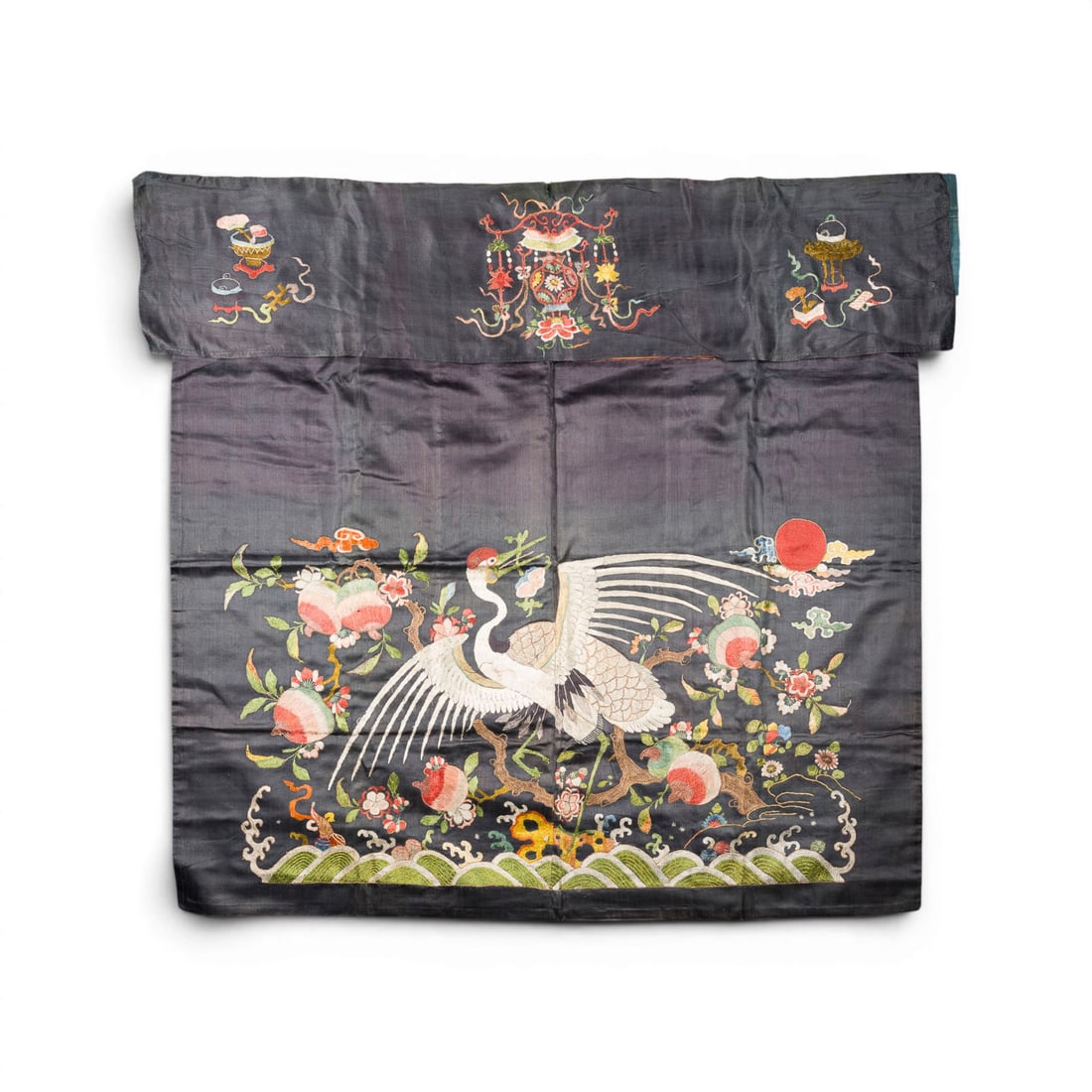 EIN BESTICKTER SEIDEN-WANDBEHANG: AN EMBROIDERED SILK WALL HANGING China, 19th/20th century Embroidery. 96 x 98 cm. The hanging is decorated with a crane and peaches. With traces of age and use, partially damaged and stained.EIN