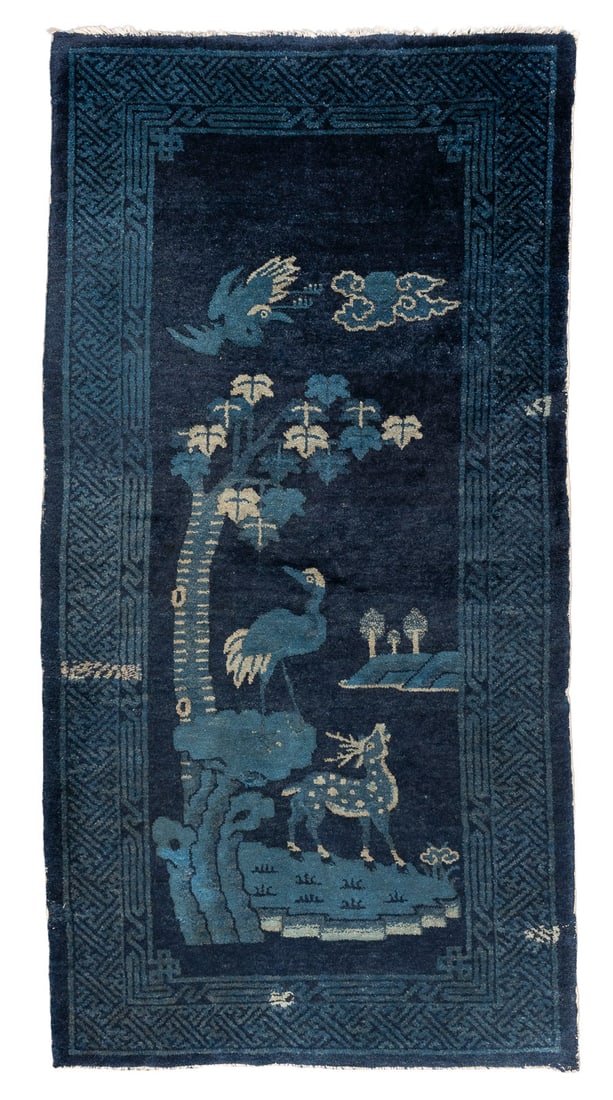 EIN PAOTAO-TEPPICH: A PAOTAO RUG China, 19th/20th century Wool. 144 ? 74 cm. With traces of age and use, with areas of restoration.EIN PAOTAO-TEPPICH China, 19./20. Jahrhundert Wolle. 144 ? 74 cm. Mit Alters- und Gebrauc