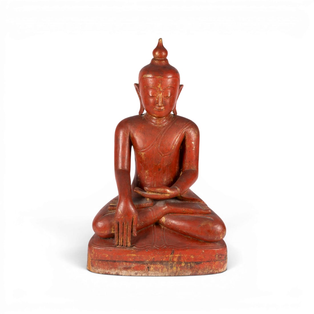 EINE GROSSE LACKIERTE HOLZFIGUR DES BUDDHA SHAKYAMUNI: A LARGE LACQUERED WOOD FIGURE OF BUDDHA SHAKYAMUNI Burma, 17th/18th century Wood. H. 98 cm. The Buddha Shakyamuni is seated in vajrasana on a pedestal, his right hand in bhumisparsa mudra and his left