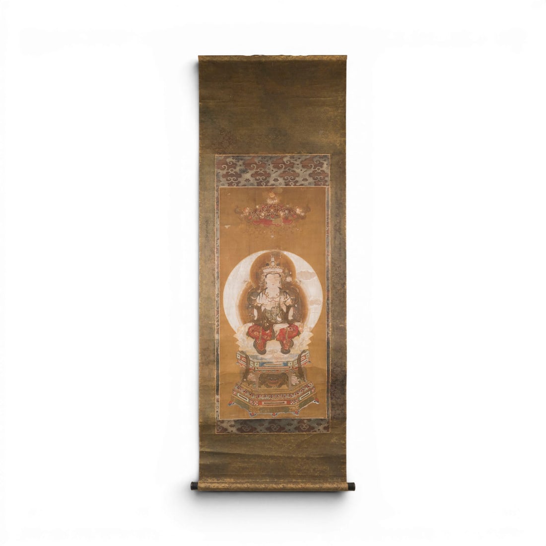 EINE HAENGEROLLE MIT DARSTELLUNG DER ROKUJI KANNON: A KAKEMONO DEPICTING ROKUJI KANNON Japan, Edo period or earlier Ink and colour on silk, framed as a hanging scroll and under glass. 188 ? 78 cm (incl. frame). With traces of age, partially damaged,