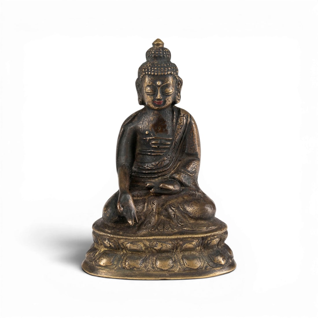 EINE BRONZEFIGUR DES BUDDHA SHAKYAMUNI: A BRONZE FIGURE OF BUDDHA SHAKYAMUNI China (Tibet) Bronze. H. 11 cm. With traces of age, partially abraded.EINE BRONZEFIGUR DES BUDDHA SHAKYAMUNI China (Tibet) Bronze. H. 11 cm. Mit Altersspuren,