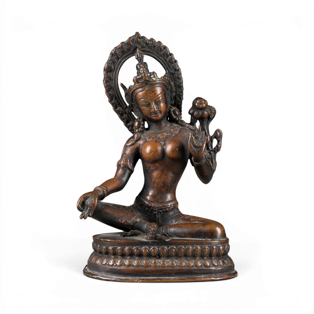 EINE BRONZEFIGUR DER GRUENEN TARA: A BRONZE FIGURE OF GREEN TARA Nepal Bronze. H. 17.2 cm. With traces of age, partially abraded.EINE BRONZEFIGUR DER GRUENEN TARA Nepal Bronze. H. 17,2 cm. Part. ber., mit Altersspuren.